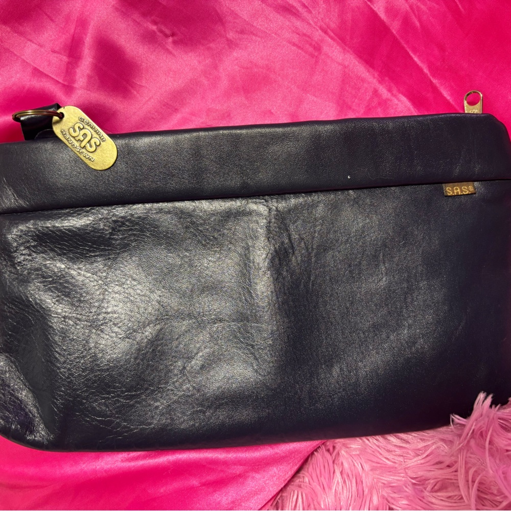 SJS Black Leather Clutch with Gold Accent Tag